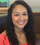 Alejandra Medley, account manager, wearing a red shirt at V.R. Williams and Company in Winchester, TN