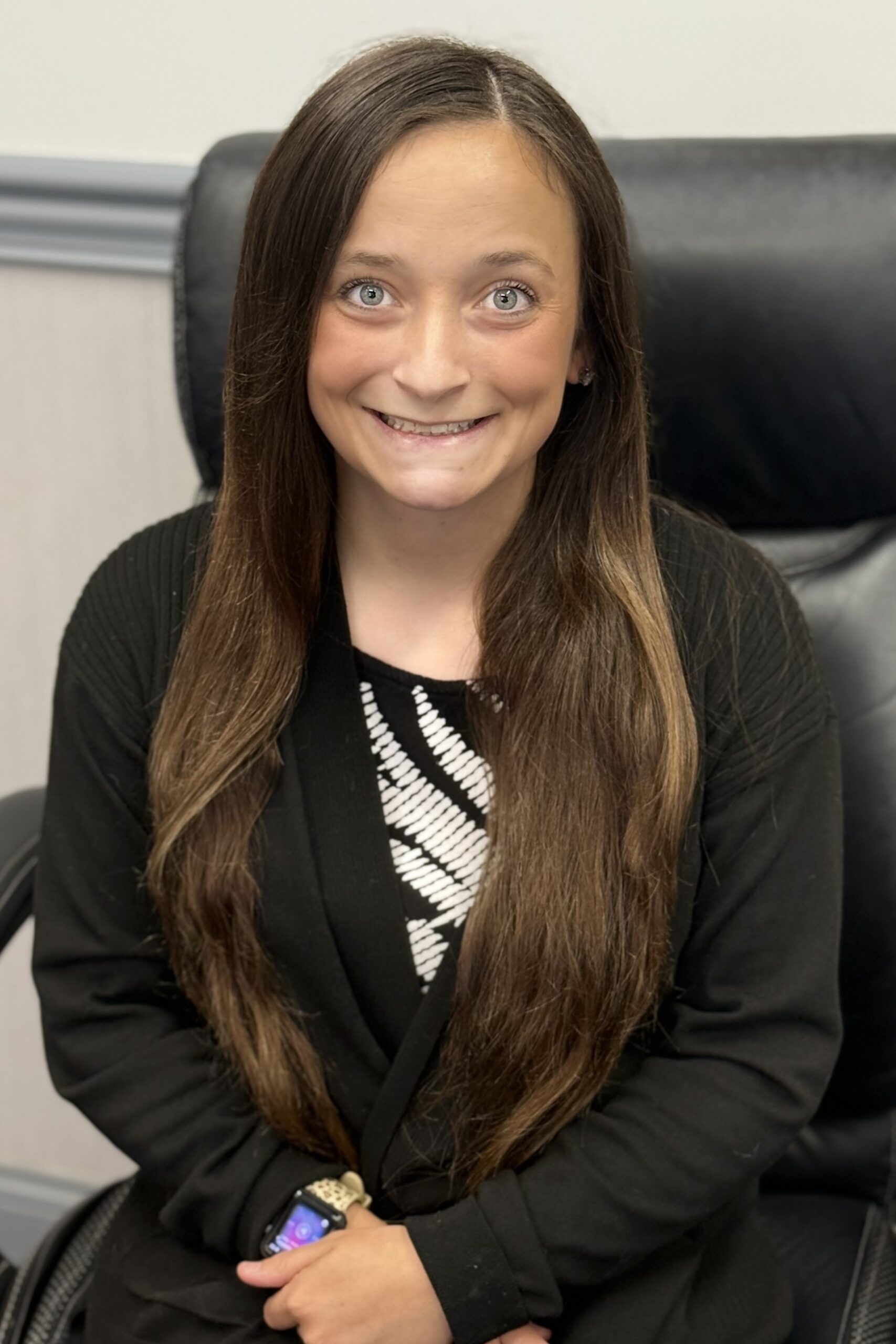 Alejandra Medley, account manager, wearing a red shirt at V.R. Williams and Company in Winchester, TN