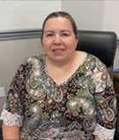 Angela-New-Employee-Photo-2023-resized Emily Hayslette, receptionist, wearing a black shirt over a striped shirt at V.R. Williams and Company in Winchester, TN